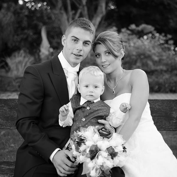 Bride and Groom with Son at East Court, East Grinstead wedding
