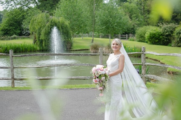 Bride with Coltsford Mill fountain behind