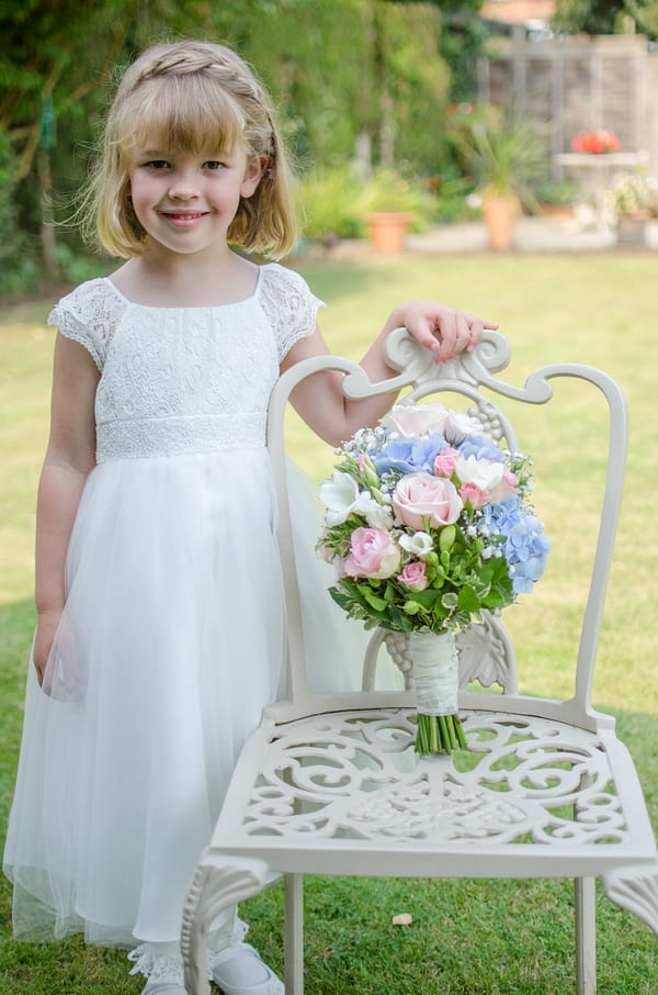 Flower girl with bouquet from Pipers Florist Oxted