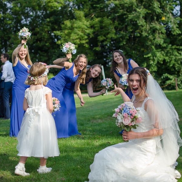 Bride with bridesmaids having fun at Surrey National Golf Club