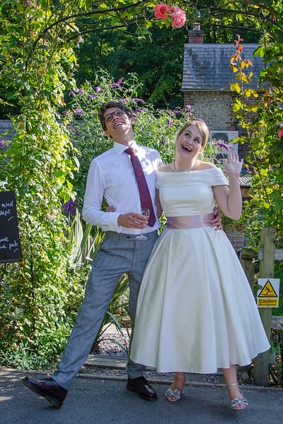 Bride and groom in a quirky style wedding photo